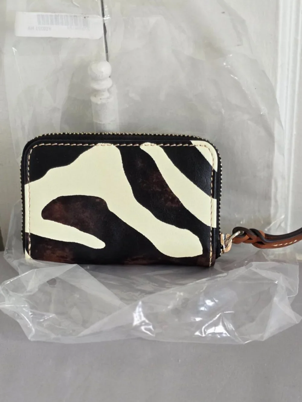 Dooney & Bourke zebra leather zip around